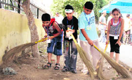 Children take part in a cleanliness drive in Ludhiana on Sunday.
