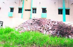 The state of affairs outside the newly constructed houses for IAF personnel which remain unoccupied as the UT administration is yet to issue occupation certificates