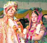 Amritsar resident Pawan Kumar Narang and his bride from Pakistan, Anita, in Amritsar 