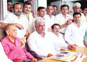 Former union minister of state for home I.D.Swami (left) and Ram Kumar Alba, district president of the INLD (2nd from left), address a press conference in Karnal
