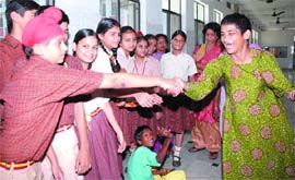 Students of St Soldier Divine Public School interact with inmates of Pingla Ghar. 