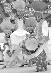 Students perform bhangra on the concluding day of Punjabi University Zonal Youth Festival at Physical College of Education in Patiala on Wednesday. 