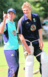 Australian skipper Ricky Ponting makes a point to his teammate at Mohali on Wednesday. 