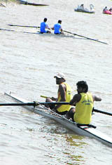  An event in progress during the Panjab University Inter-College Rowing Championship in Chandigarh on Wednesday. 