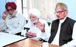 Trustees of Desh Bhagat Yaadgar Hall Committee address a press meet in Jalandhar on Wednesday. 