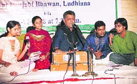 Artistes perform at a ghazal evening in memory of Ahmad Faraaz.