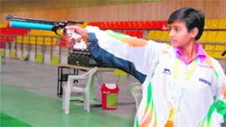 India's Deepika Patel, gold medalist in 10m air pistol, in action during the  Commonwealth Youth Games in Pune