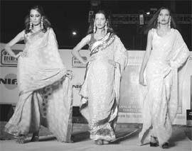 Models display dresses of NIFD at Gymkhana Club in Patiala on Thursday. 