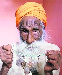 Bachan Singh, with his medals, who fought a long battle for his dues and received pension arrears of about 60 years in April, 2008. 