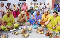 Women inmates of the Central Jail performing Karva Chauth rituals in Bathinda