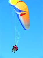 Paragliders sailing in air during the Pre-World Cup Championship on Friday. 