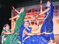 Students of Guru Nanak Girls College, Ludhiana, perform dandia during the diamond jubilee celebrations