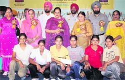Surinder Kaur, wife of CM Parkash Singh Badal, and Punjab minister of education Dr Upenderjit Kaur, with the winners