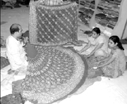 Women choose lehngas at a showroom in Patiala on Saturday.