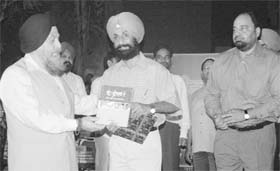 Vice-chancellor of Punjabi University Dr Jaspal Singh released a book  Geet mutiyaran de on university campus in Patiala