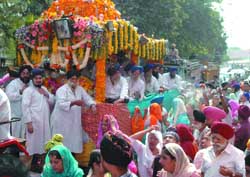 A view of the nagar kirtan held in New Delhi on Sunday, the occasion of the 300th year of Gurta Gaddi Divas of Shri Guru Granth Sahib.
