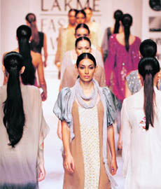 Models display creations by Nikasha during the first day of Lakme India Fashion Week in Mumbai on Monday. As many as 75 designers are unveiling their Spring Summer collections at the five-day event scheduled to end on October 24.