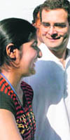 AICC general secretary Rahul Gandhi interacts with a young girl at Ramnagar on Monday. Rahul is on a three-day visit to the state.