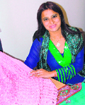 Mitu Saluja, a fashion designer, displays her new collection.