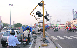 Damaged traffic lights at the busy ITI chowk on the GT Road in Karnal. The officials concerned have failed to repair these and drivers face difficulties on the highway, especially at night.