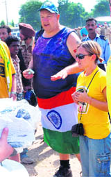A foreigner moves around freely with the National Flag wrapped below his waist outside the PCA stadium, Mohali, on Tuesday.