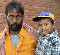 Ram Bharose meets his son Ankit after a month at the Juvenile Home in Sector 25, Chandigarh, on Wednesday. 