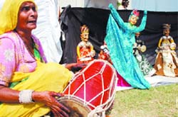 An artiste performs during the MTNL Perfect Health Mela at Laxmibai Nagar 