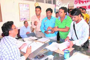 Members of the Deaf and Dumb Welfare Society present a memorandum of its demands to the SDM in Karnal on Wednesday.
