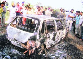 The car in which a youth was found charred to death near Ahmedgarh