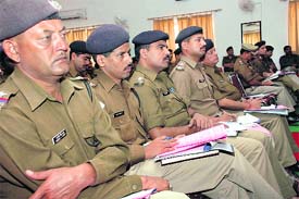 Uttarakhand DGP Subhash Joshi addresses police officials at a workshop on Community Policing in Police Lines, Dehradun, on Thursday.