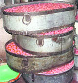 Meanwhile, sweets lie uncovered at a shop in Ludhiana.