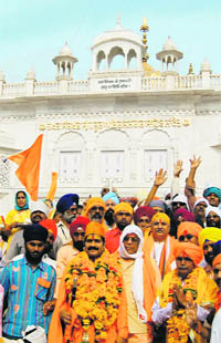 A nagar kirtan taken out from the native village of Bhagat Namdev being received at Takht Hazur Sahib on Thursday.