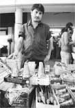 A shopkeeper prepares a crackers stall in Sector-22