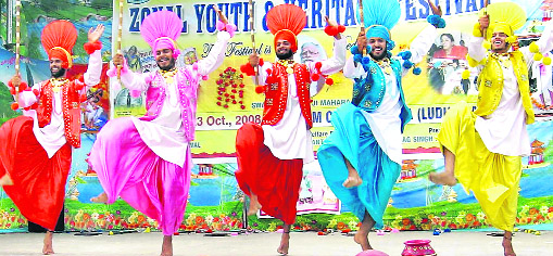 Students perform bhangra at Panjab University Zonal Youth and Heritage Festival at Sri Ram College, Dalla. 