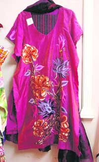An exhibition of hand and machine-embroidered suits, kurtis and tunics in satin, cotton and crepe by Swati P. Gill at Hotel Aroma-22