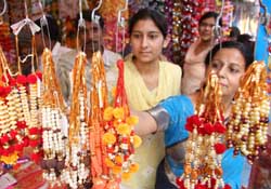 Ahead of the festival of lights, women purchase decorative material from a market in Bathinda on Sunday.