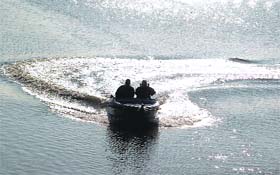 Life guards patrol the Sukhna Lake in Chandigarh