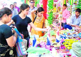 Girls busy shopping on the occasion of Dhanteras. 