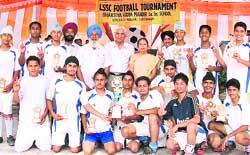The team of Nankana Sahib Public School after winning the Sahodaya Schools Complex Football Tournament in Ludhiana on Sunday.