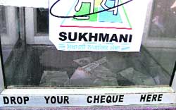The Sukhmani Centre at the Zone-D office of the municipal corporation which has been closed two years back and (right) the drop box at the centre which has a few electricity bills, cheques and Rs 5 lying for the past two years.
