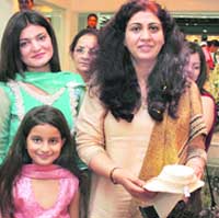 Customers at newly opened Gitanjali Jewels on the Mall road in Ludhiana.