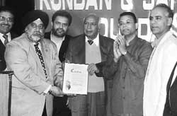J. C. Nagpal is honoured for social service, in New York