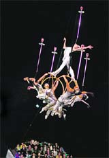 Acrobats perform at the opening ceremony of the 8th International Acrobatics Festival in Wuhan, Hubei province, on Saturday. 