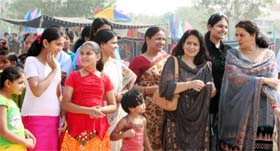 Ramesh Kumari Sharma, chairperson of the BSF Wives Welfare Association (extreme right), takes a round after inaugurating the Diwali Mela in Abohar