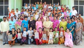 Students of Gopi Chand Arya Mahila College, Abohar, make a victory sign after winning 32 prizes in the PU Muktsar Zone Youth and Heritage Festival