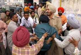 Cops try to control the protesters following clash between two groups of PRTC employees
