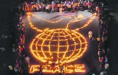 Activists of the All India Anti-Terrorist Front light over 4,000 diyas to spread the message of peace in Chandigarh 