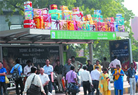 The New Delhi Municipal Corporation filled a bus stop roof with dummy gifts on the occasion of Divali at Jantar Mantar in New Delhi on Monday.