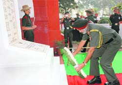 IMA Commandant Lt Gen Rajinder Singh Sujlana lays a wreath at Lal Gate War Memorial in Dehradun on Monday. 