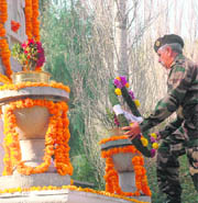 GOC 15 Corps, Lt Gen Mukesh Sabharwal pays tribute to the martyrs at the Badami Bagh Cantt War Memorial in Srinagar on Monday.
